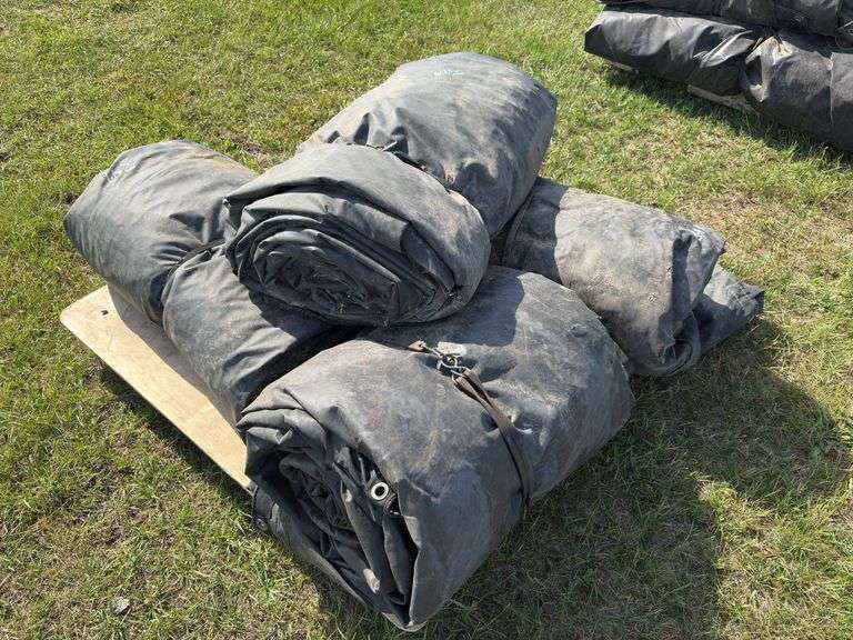 Assorted sizes of lumber & steel tarps, approx 4, *Unreserved*