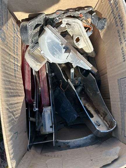 Box w/ Seatbelts, Taillight, Backup Lights, Custom Taillight & Speedometer, Box w/ 1971 Custom 10 Chevy Misc Parts, Heater Motor Shroud 70's Chevy/GM, Rad Fan, Crate w/ Misc. Metal Brackets *Unreserved*