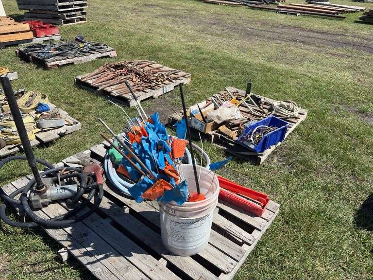 Pallet w/ Fuel pump w/ motor - unknown condition, fuel pump, bucket of market flags, *Unreserved*