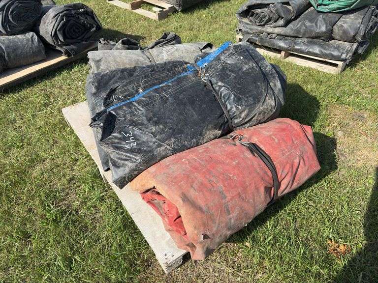 Assorted sizes of lumber & steel tarps, approx 5, *Unreserved*
