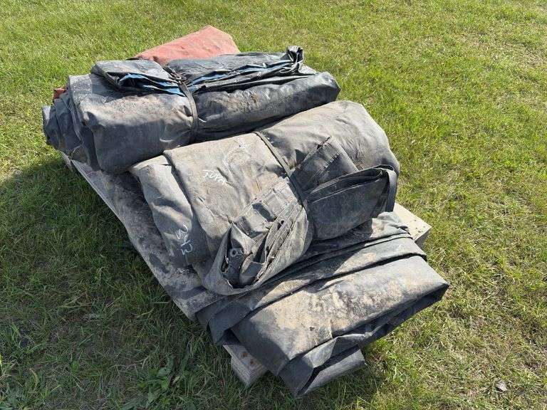 Assorted sizes of lumber & steel tarps, approx 5, *Unreserved*