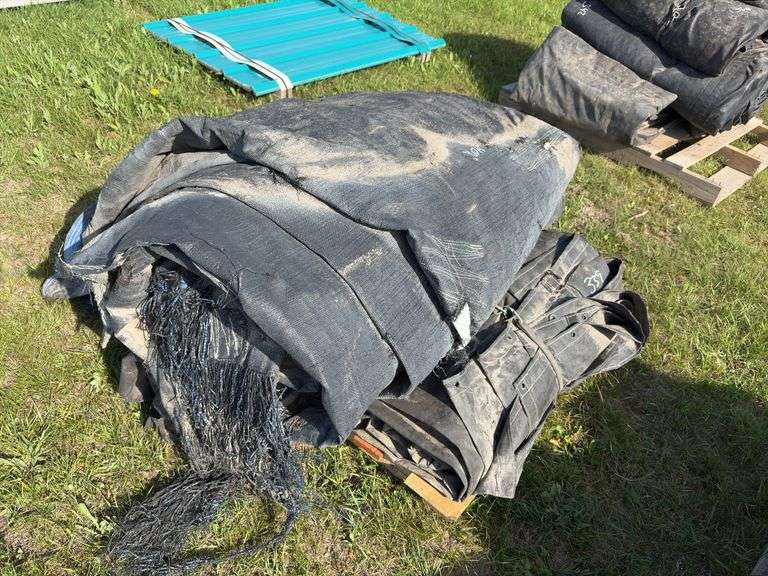 Assorted sizes of lumber & steel tarps, approx 4, *Unreserved*