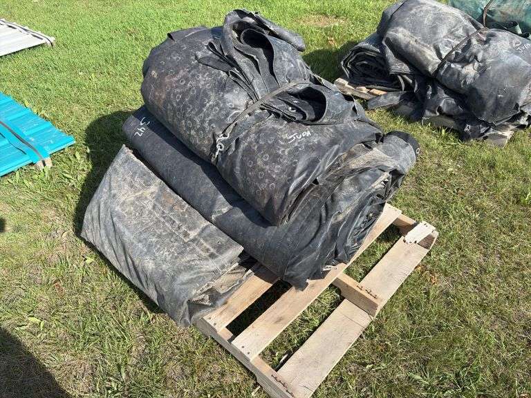 Assorted sizes of lumber & steel tarps, approx 4, *Unreserved*