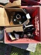 Crate w/ Fan Clutch, Heater Motor, GMC Hord Cover, Door Handle & Misc Plastic Trim, 1 - Crate w/ Taillights 2 - Ford Truck & 2 - Chevy Truck, 80's Datsun Custom Dash w/ Gauges & Switch Panel, 1 - Box w/ Misc. Cords, Saw Blade, & Lens Covers *Unreserved*