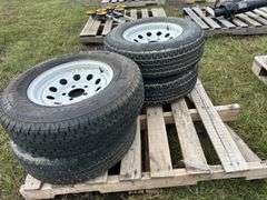 4 Mission Radial ST tires (Trailer) ST205/175R14, 4 white 5 bolt utility rims, *Unreserved*