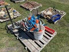 Pallet w/ Fuel pump w/ motor - unknown condition, fuel pump, bucket of market flags, *Unreserved*