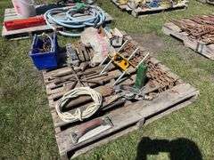 Pallet w/ chain, 3 - 4 way lugs, spiral hay tarp anchors, *Unreserved*