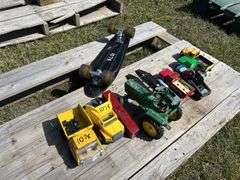 Pallet w/ Vintage toy vehicles, metal/plastic Tonka, John Deere (approx 9), Mini skateboard 1'9", *Unreserved*
