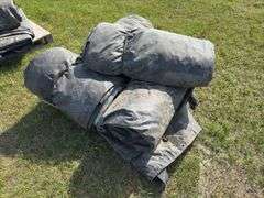 Assorted sizes of lumber & steel tarps, approx 4, *Unreserved*