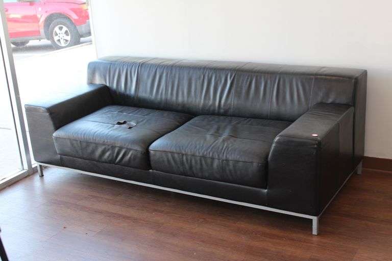 BLACK LEATHER LIKE 3-PERSON LOW COUCH APROX 7'x 3'x2.5'
