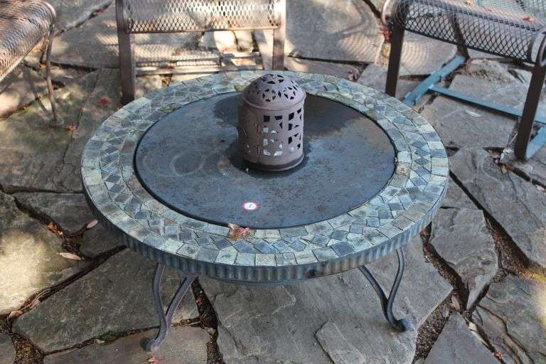 METAL OUTDOOR FIRE PIT WITH HIDEAWAY TOP & GRILL SURFACE INCLUDED UNDERNEATH APROX 3'