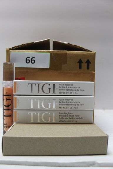 TIGI COSMETICS 764090 LUXE LIP GLOSS IN KNOCKOUT/CORAL COLOR .11FL OZ