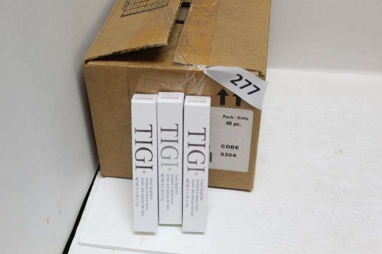 TIGI COSMETICS 764092 LUXE LIP GLOSS IN GLAMOUR/RED COLOR .11FL OZ