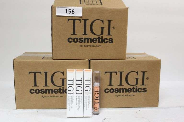 TIGI COSMETICS 764090 LUXE LIP GLOSS IN KNOCKOUT/CORAL COLOR .11FL OZ
