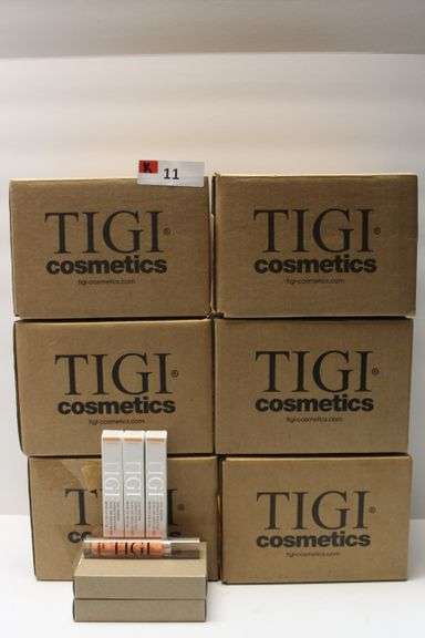 TIGI COSMETICS 764090 LUXE LIP GLOSS IN KNOCKOUT/CORAL COLOR .11FL OZ