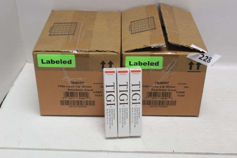 TIGI COSMETICS 764090 LUXE LIP GLOSS IN KNOCKOUT/CORAL COLOR .11FL OZ