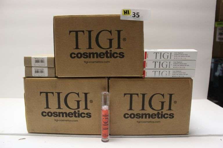 TIGI COSMETICS 764092 LUXE LIP GLOSS IN GLAMOUR/RED COLOR .11FL OZ