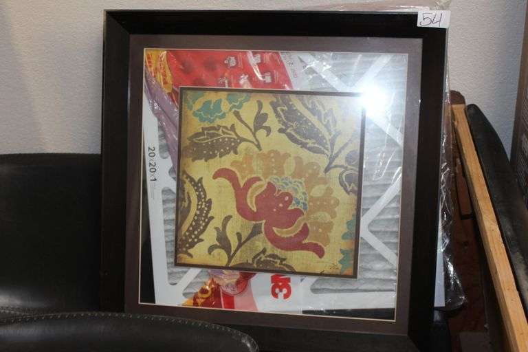 DECORATIVE FLOWER FRAME WITH GLASS SURROUNDING AND WOODEN BLACK FRAME APROX 2.5' SQ.