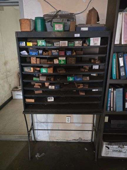 METAL 9-TIER CABINET APROX 38"x1'x3' & METAL TABLE APROX 38"x14"x30"; WITH WIDE VARIETY OF FASTENERS INCLUDED