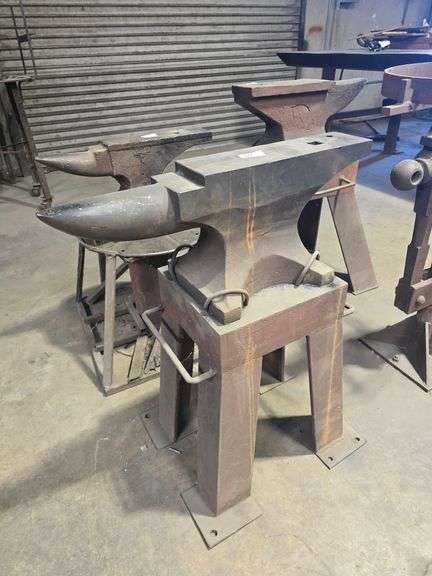 HEAVY DUTY ANVIL MOUNTED ONTO FRAME ;   ANVIL APROX DIM. 27"x4.5"x11" - TOTAL APROX DIM. 21"x18"x32.5"