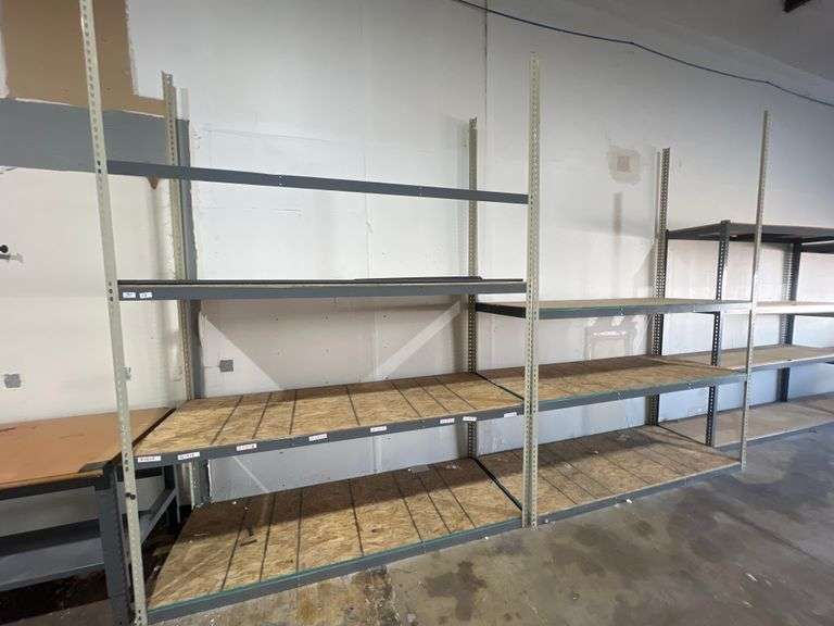 TEARDROP METAL WAREHOUSE RACKING WITH PLYWOOD SHEET SHELVING APROX 8'L x 3'W x 12'H ONE WITH 8-CROSSMEMBERS THE OTHER WITH 6