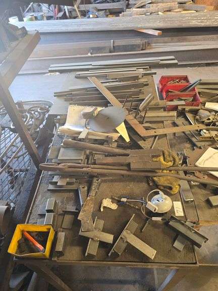 SOLID METAL WORK BENCH APROX 52"x 21" x 31" ; FULL OF STEEL STOCK