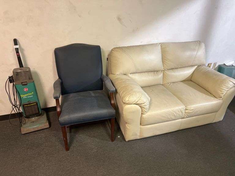 FRONT WAITING ROOM DÉCOR AND HOOVER POWERMAX II VACUUM AND WOODEN WINE RACK CABINET