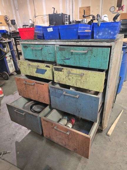 METAL WAREHOUSE TOOL ORGANIZER WITH 8-DRAWERS AND SOLID WOOD TOP APROX 3'x22"x3' COMPLETELY FULL OF METAL FABRICATION HARDWARE & TOOLS