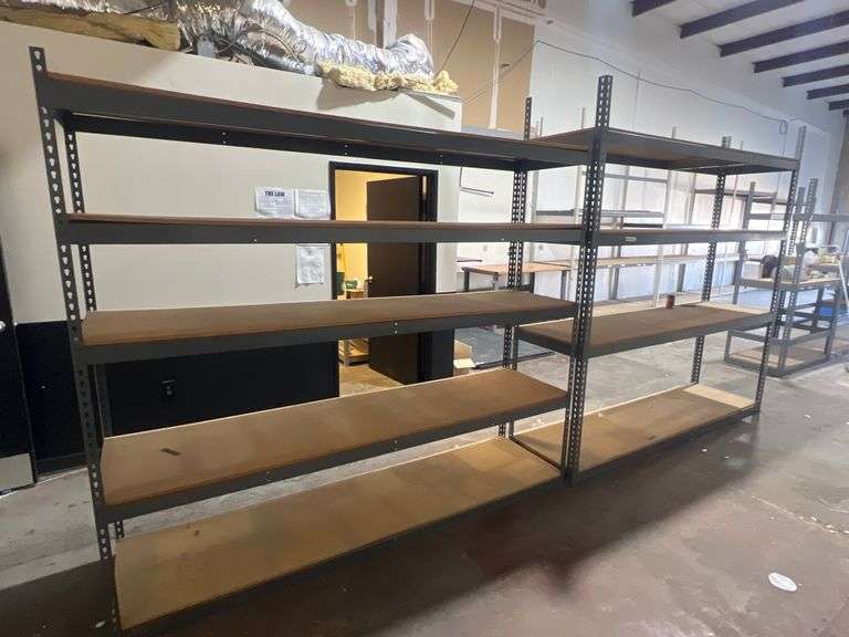 TEARDROP METAL SHELVING UNIT WITH PRESSED WOOD SHELVING APROX 8'L x 2'W ONE UNIT IS 7'H WITH 5-SHELVES ; THE OTHER IS 8'H WITH 4-SHELVES