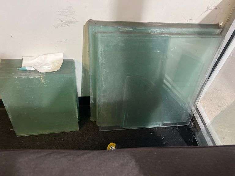 TEMPERED GLASS PANES SIZES INCLUDE (15) 15"x21" ; (35) 15"x17.5" ; (6) 25.5"x26" AND SIMILAR SMALL SIZES