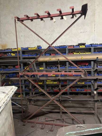 SOLID IRON STOCK PCS.. ABOUT 15+ PCS TOTAL IN LOT WITH SOLID METAL MATERIAL STANDS INCLUDED 5-TIER APROX 117" x 20" x 69"  & 7-TIER APROX 108" x 24" x 66" **sold per stand