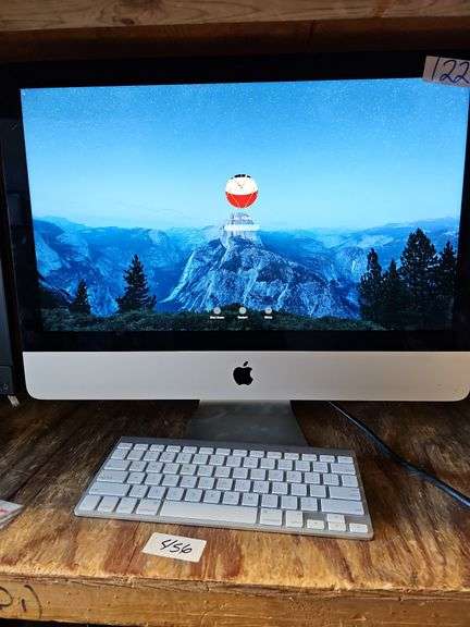APPLE ALL IN ONE PC MONITOR WITH POWER CABLE AND WIRELESS KEYBOARD A1314 INCLUDED *powers on but password protected