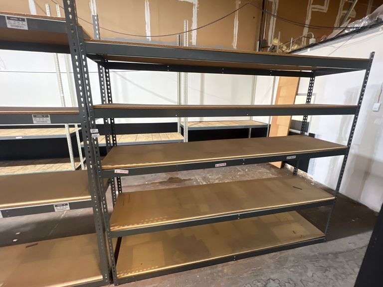 TEARDROP METAL SHELVING UNIT WITH PRESSED WOOD SHELVING APROX 8'L x 2'W ONE UNIT IS 7'H WITH 5-SHELVES ; THE OTHER IS 8'H WITH 4-SHELVES