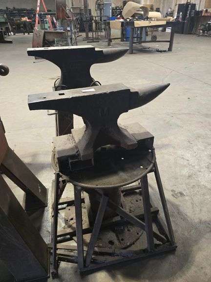 HEAVY DUTY ANVIL WELDED ONTO FRAME ;  ANVIL APROX DIM. 23"x4"x1' - TOTAL APROX DIM. 26"SQ. BASE x 29"