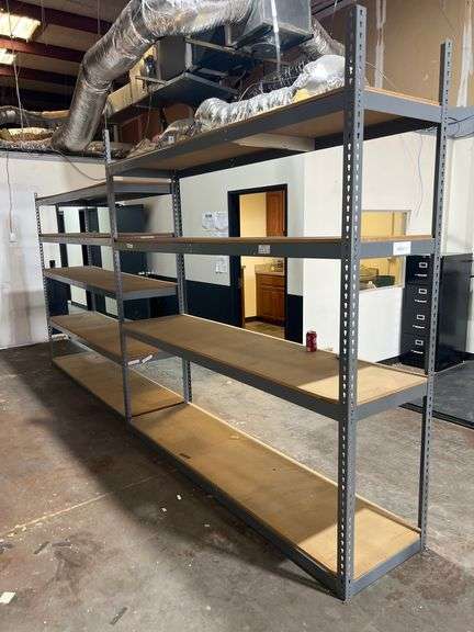 TEARDROP METAL SHELVING UNIT WITH PRESSED WOOD SHELVING APROX 8'L x 2'W ONE UNIT IS 7'H WITH 5-SHELVES ; THE OTHER IS 8'H WITH 4-SHELVES