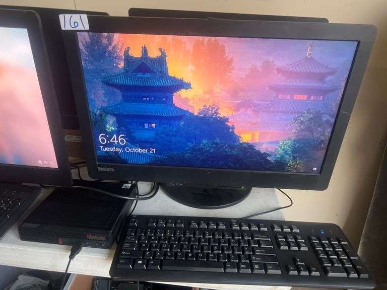 LENOVO THINKCENTRE 10DQD TINY IN ONE 23" MONITOR; WITH P340 30DF MINI PC CORE i5 vPro INTEL; USB KEYBOARD INCLD. Powers on, password protected, single Lenovo power cable incld. With lot