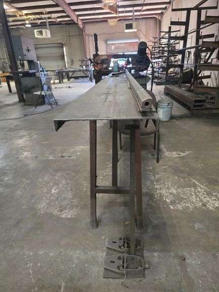 SOLID METAL STAND APROX 1' x 12' x 39" WITH SOME METAL AND FOOT PETAL CONTROL INCLD.