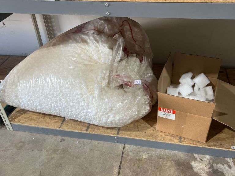 LARGE BAG FULL OF PACKING PEANUTS AND ULINE S-23844 PLAIN FOAM CORNER BLOCKS