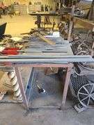 SOLID METAL WORK BENCH APROX 52"x 21" x 31" ; FULL OF STEEL STOCK