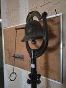 SOLID METAL STANDING BELL APROX 6'H