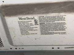 WEST BEND 900W STAINLESS STEEL AND BLACK MICROWAVE FOR REPAIR