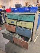 METAL WAREHOUSE TOOL ORGANIZER WITH 8-DRAWERS AND SOLID WOOD TOP APROX 3'x22"x3' COMPLETELY FULL OF METAL FABRICATION HARDWARE & TOOLS
