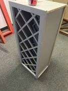 FRONT WAITING ROOM DÉCOR AND HOOVER POWERMAX II VACUUM AND WOODEN WINE RACK CABINET