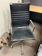 BLACK LEATHER LIKE OFFICE CHAIR WITH POLISHED CHROME METAL APROX 23"x20"x44"