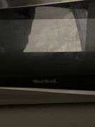 WEST BEND 900W STAINLESS STEEL AND BLACK MICROWAVE FOR REPAIR