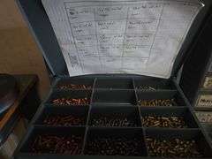 METAL SMALL HARDWARE ORGANIZER WITH 6-DRAWERS FILLED WITH ORGANIZED HARDWARE APROX 15"x12"x16"