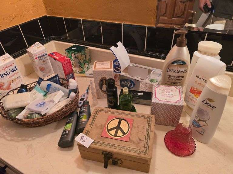 Variety of bath goods including solid wood vintage jewelry box, travel size products ect