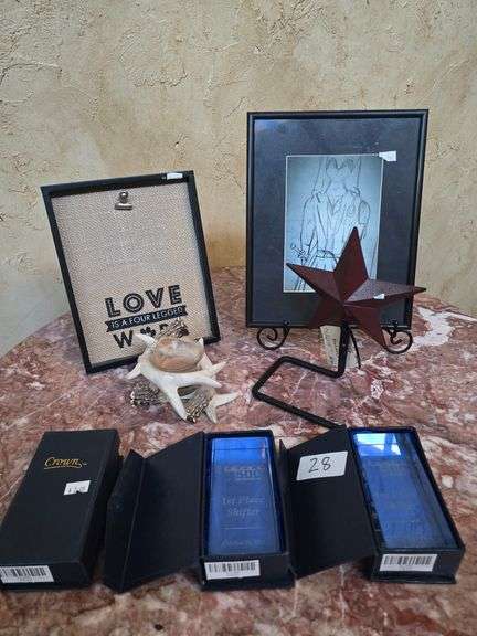 Décor including trophies, wall art, toilet paper holder ect