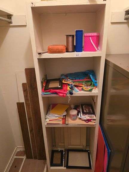 variety of craft supplies such as photo frames, cards & envelopes, ribbon, ect