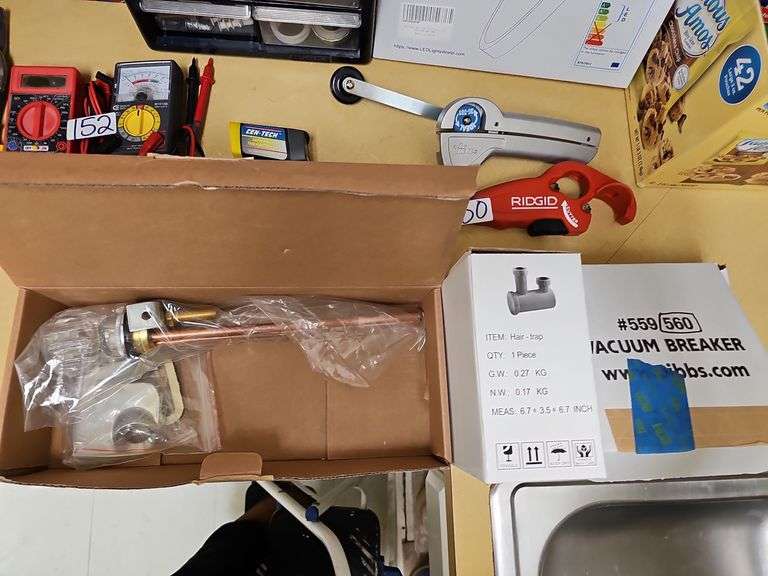 SALON SINK HARDWARE SUCH AS HAIR-TRAP PIECE, PIBBS 560 VACUUM BREAKER KIT, AND PIBBS SINGLE HANDLE FAUCET MODEL 562